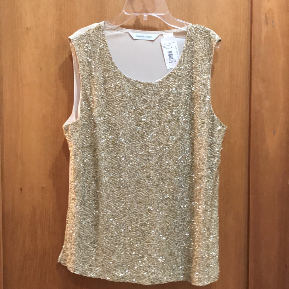 Draper’s and Damon’s gold sequin top